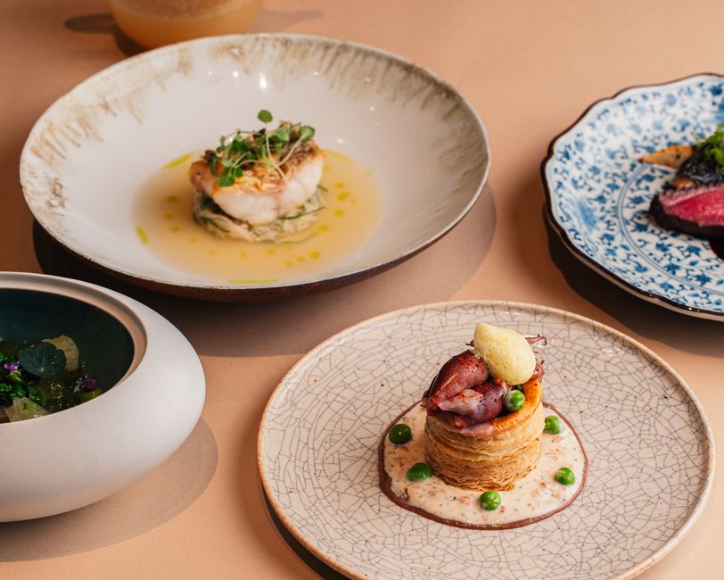 A selection of artistic fine dining dishes at an upscale restaurant in Tokyo, Japan.